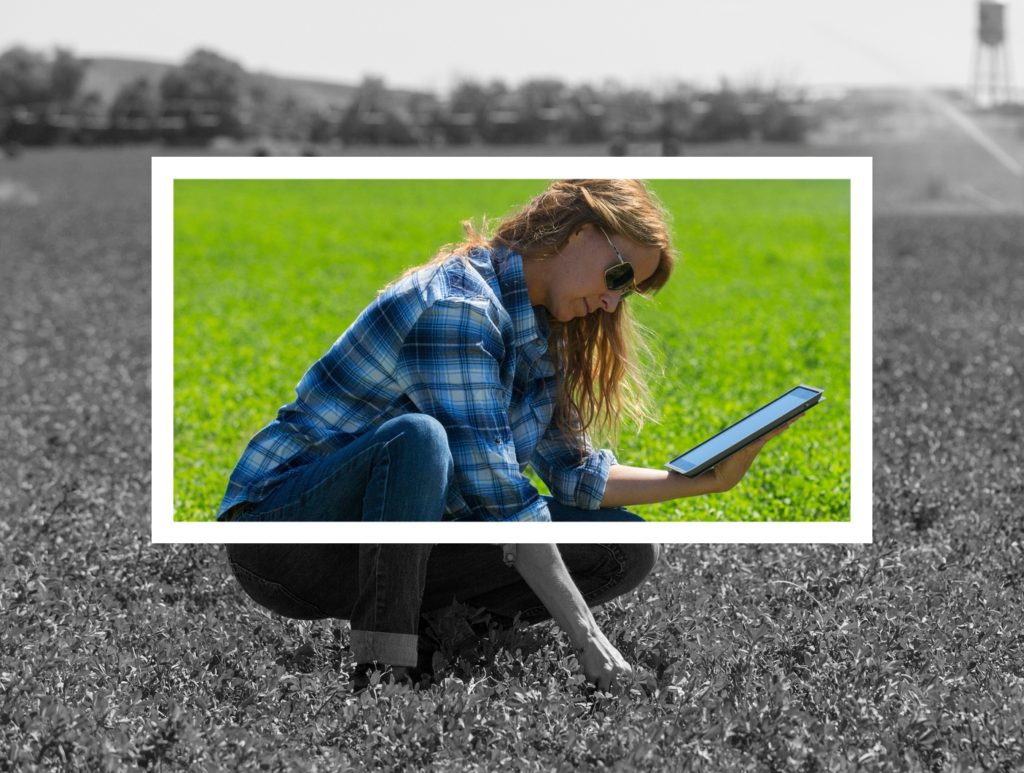 Caucasian farmer using digital tablet in field Crop ETc provides easy regulatory compliance